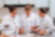 Photograph shows three women chefs preparing food together in a kitchen, using whisks and colorful utensils. White chef coats, smiling teamwork, and round PichaEats sign highlight a collaborative culinary workshop or cooking event.​