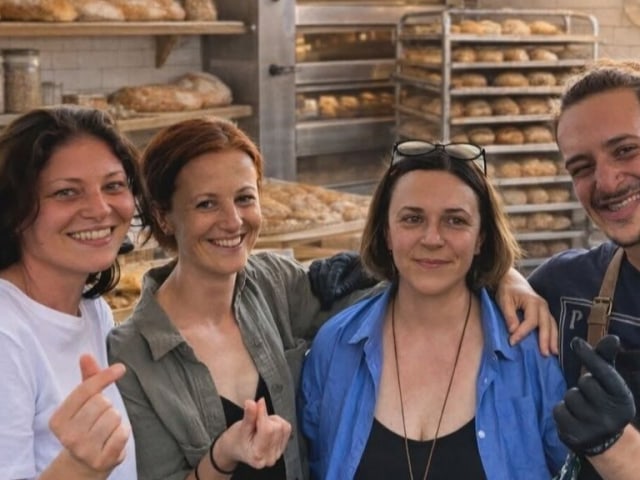 People are standing together for local food, handmade goods