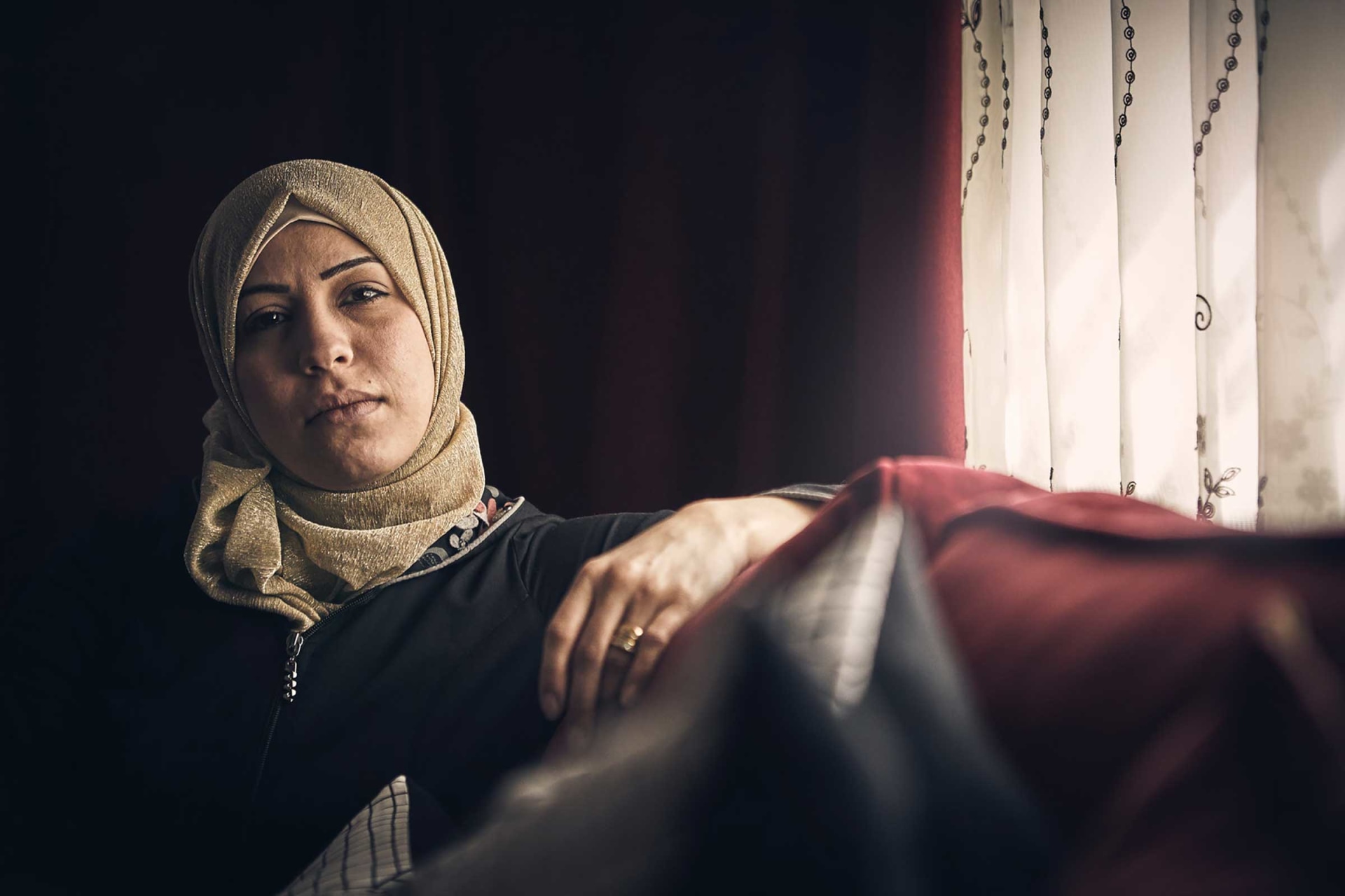 Woman sitting in sofa