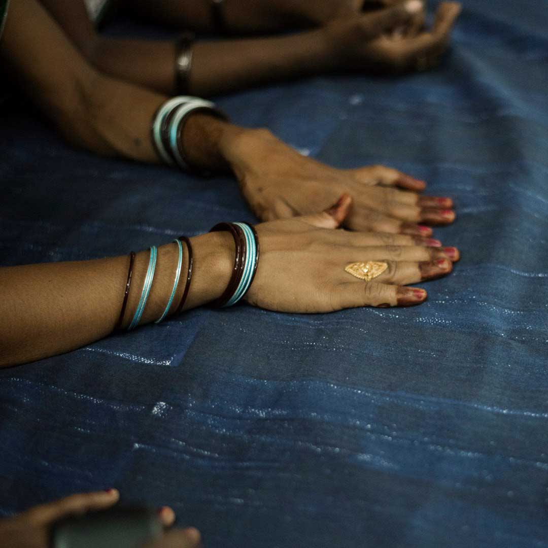 Hands on fabric